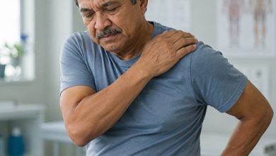 Older man experiencing shoulder and hip stiffness associated with polymyalgia rheumatica